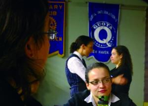 Thomas comforts and reassures a distraught Melissa in the background.  (Photo: Liz Rywelski)